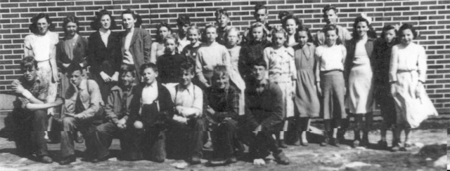 517: Group of 28 children. (circa 1950) [courtesy of Lorna Richardson] ** also see 516 **  Standing left-to-right, Marie Ryan, Margie Norman, Angela Ryan, Betty Ennis,  Annie Norman, Babe Ennis, Gerard Lambe, Mary Ennis, Noreen Ryan, Kevin Ryan,  Madonna McCarthy, Joe Dunphy (in back), Beth Lambe (dark outfit), Madonna Whelan (light outfit),  Gwen Carroll, Mary Reddy, Camillus Dunphy (back), Teresa Whelan (white top),  Marie Counsel, Imelda Ryan, Mary Finn; kneeling left-to-right, Paul McCarthy, Gordon Carroll,  David Ryan, Francis Barry, Patrick Lambe, William Barry (?), Adrian Ryan.  - Francis Barry (of Thomas Barry &amp;amp; Catherine Corrigan)  - William Barry ? (of Thomas Barry &amp;amp; Anne Dollimont)  - Gordon Carroll (of Michael Carroll &amp;amp; Josephine Barry)  - Gwen Carroll (of Michael Carroll &amp;amp; Josephine Barry)  - Marie Counsel (of Michael Counsel &amp;amp; Mary Anne Barry)  - Camillus Dunphy (of Thomas Dunphy &amp;amp; Anastasia Carroll)  - Joe Dunphy (of Thomas Dunphy &amp;amp; Anastasia Carroll)  - Babe Ennis (of Vincent Ennis &amp;amp; Mary Carroll)  - Betty Ennis (of Vincent Ennis &amp;amp; Mary Carroll)  - Mary Ennis (of Vincent Ennis &amp;amp; Mary Carroll)  - Mary Finn (of Patrick Finn &amp;amp; Helena Hayward)  - Beth Lambe (of James Lambe &amp;amp; Catherine Rodgers)  - Gerard Lambe (Peter Lambe &amp;amp; Anne Norman)  - Patrick Lambe (of Peter Lambe &amp;amp; Anne Norman)  - Madonna McCarthy (of James McCarthy &amp;amp; Mary Ellen Barry)  - Paul McCarthy (of Thomas McCarthy &amp;amp; Margaret Whelan)  - Annie Norman (of John Norman &amp;amp; Mary Farget)  - Margie Norman (of Charles Norman &amp;amp; Elizabeth Anne Barry)  - Mary Reddy (of Michael Reddy &amp;amp; Elizabeth Moore)  - Adrian Ryan (of Albert Ryan &amp;amp; Catherine Nolan)  - Angela Ryan (of Michael Ryan &amp;amp; Petronella Whelan)  - David Ryan (of Jeremiah Ryan &amp;amp; Josephine Lambe)  - Imelda Ryan (of Jeremiah Ryan &amp;amp; Josephine Lambe)  - Kevin Ryan (of Albert Ryan &amp;amp; Catherine Nolan)  - Marie Ryan (of Joseph Ryan &amp;amp; Ursula Barry)  - Noreen Ryan (of Albert Ryan &amp;amp; Catherine Nolan)  - Madonna Whelan (of Leo Whelan &amp;amp; Elizabeth Bishop)  - Teresa Whelan (of Leo Whelan &amp;amp; Elizabeth Bishop)